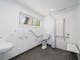 Premium family cabin showing large wheel chair friendly and accessible bathroom