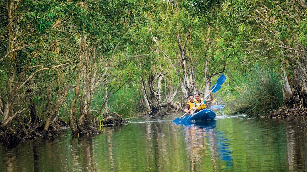 Two people Kayaking along Deepwater Creek