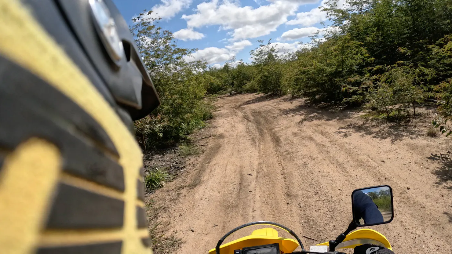 POV footage riding through a dirt track on a motorbike