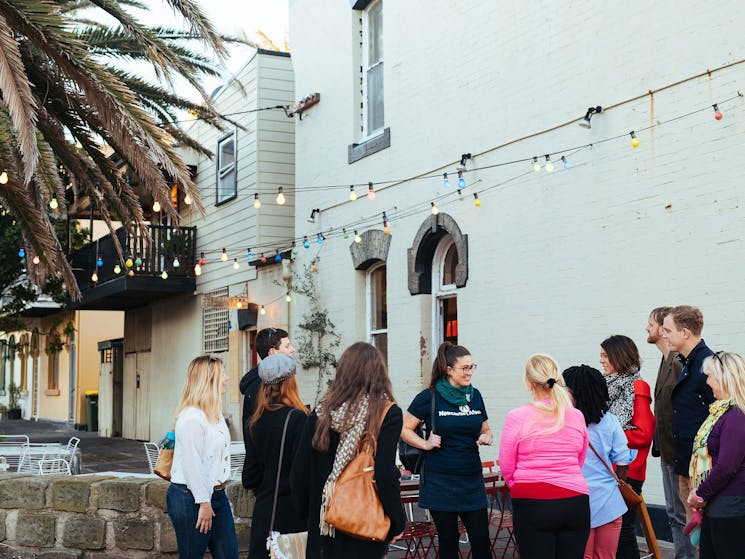 Newcastle Afoot walking tour guests in Newcastle East on a bar tour