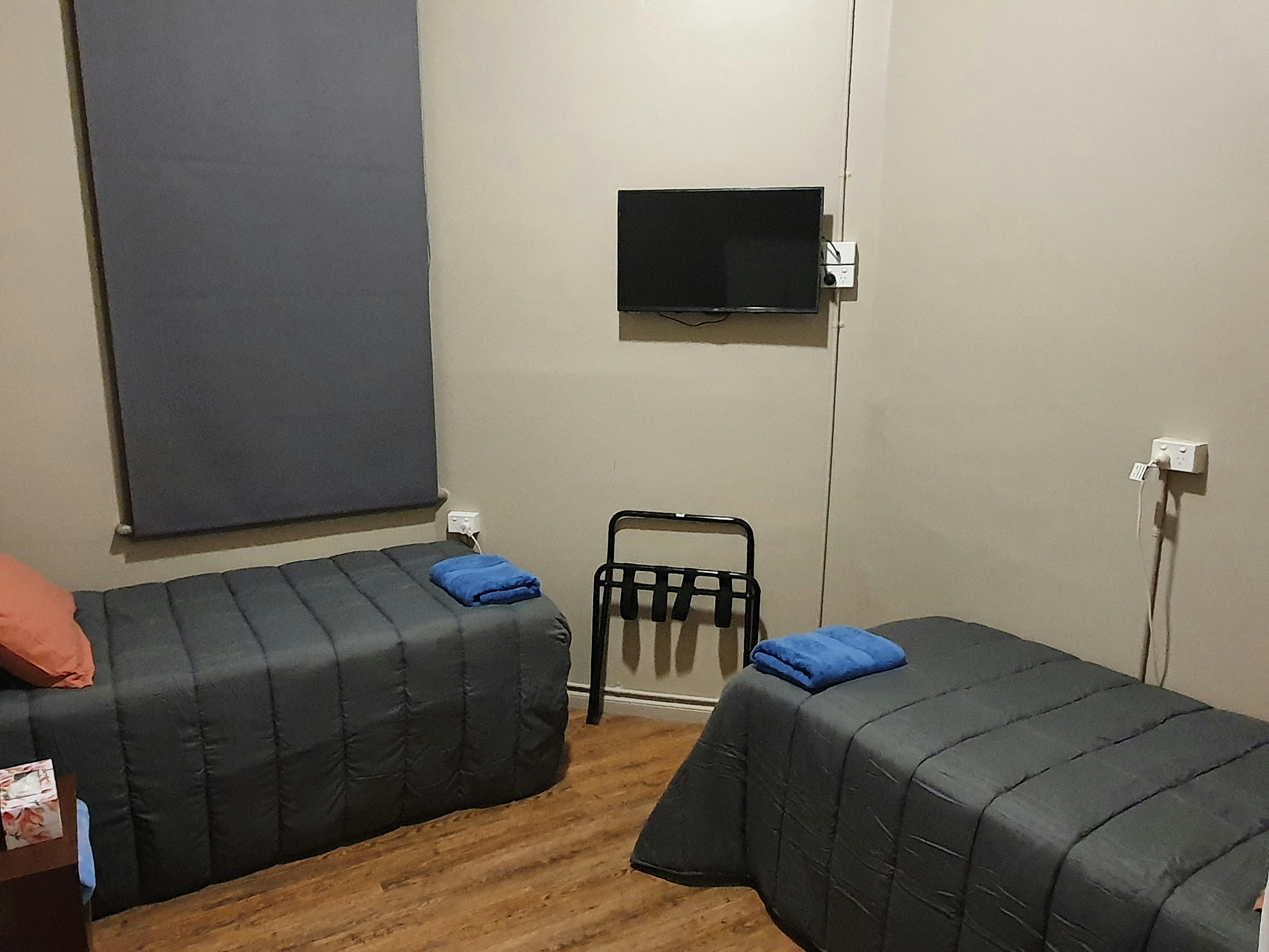 Accommodation room showing twin single beds