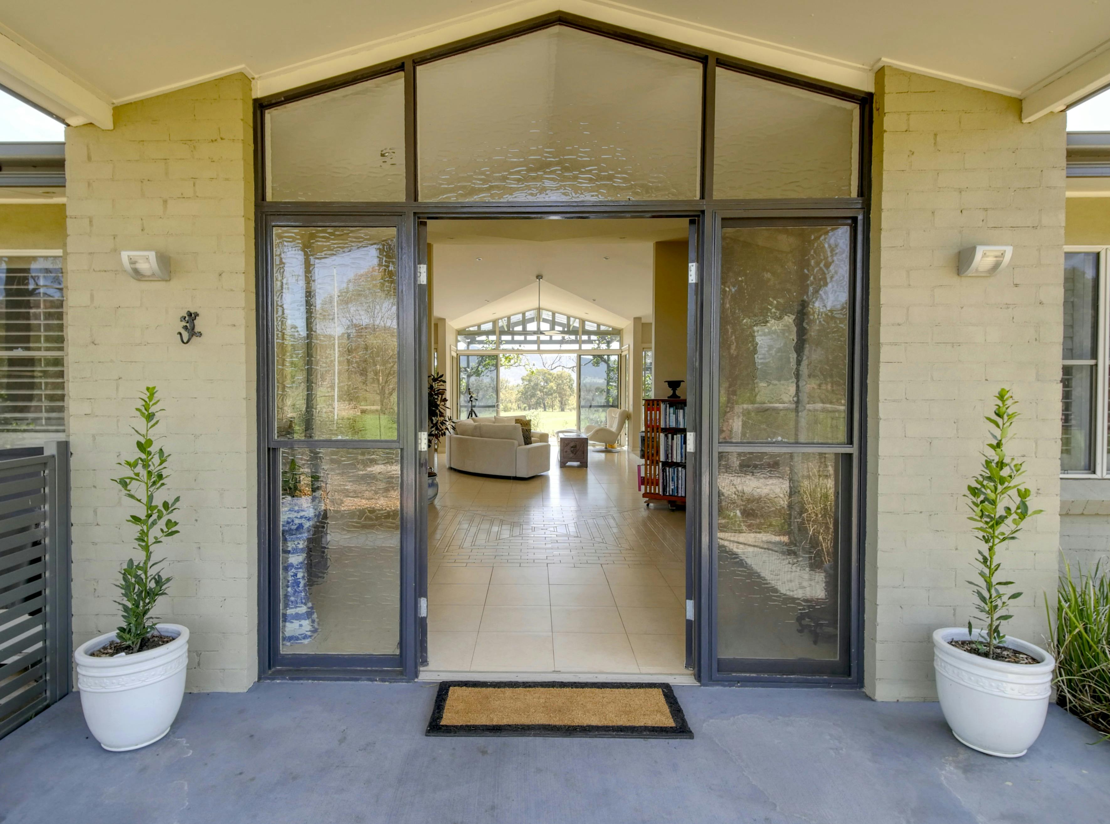 Entrance to Belle Bois with a view into the foyer and Great Room lounge area.