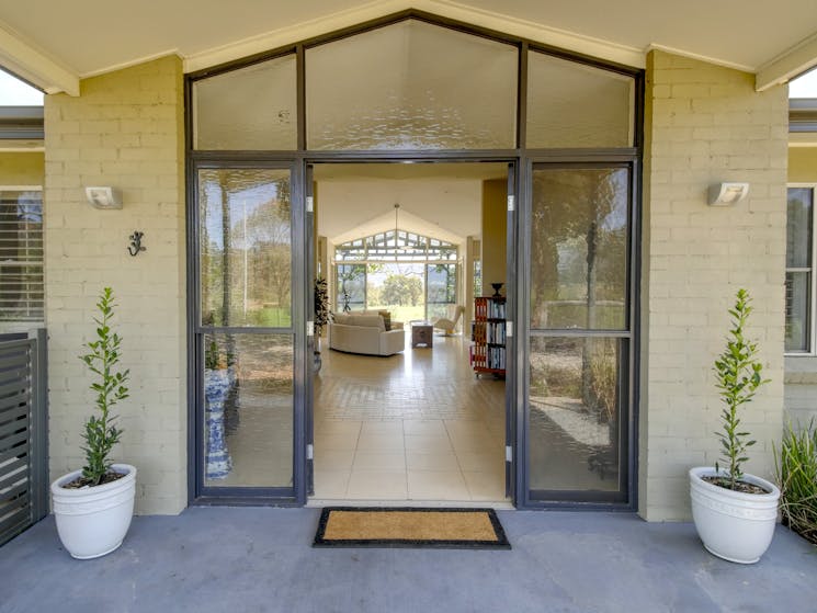 Entrance to Belle Bois with a view into the foyer and Great Room lounge area.