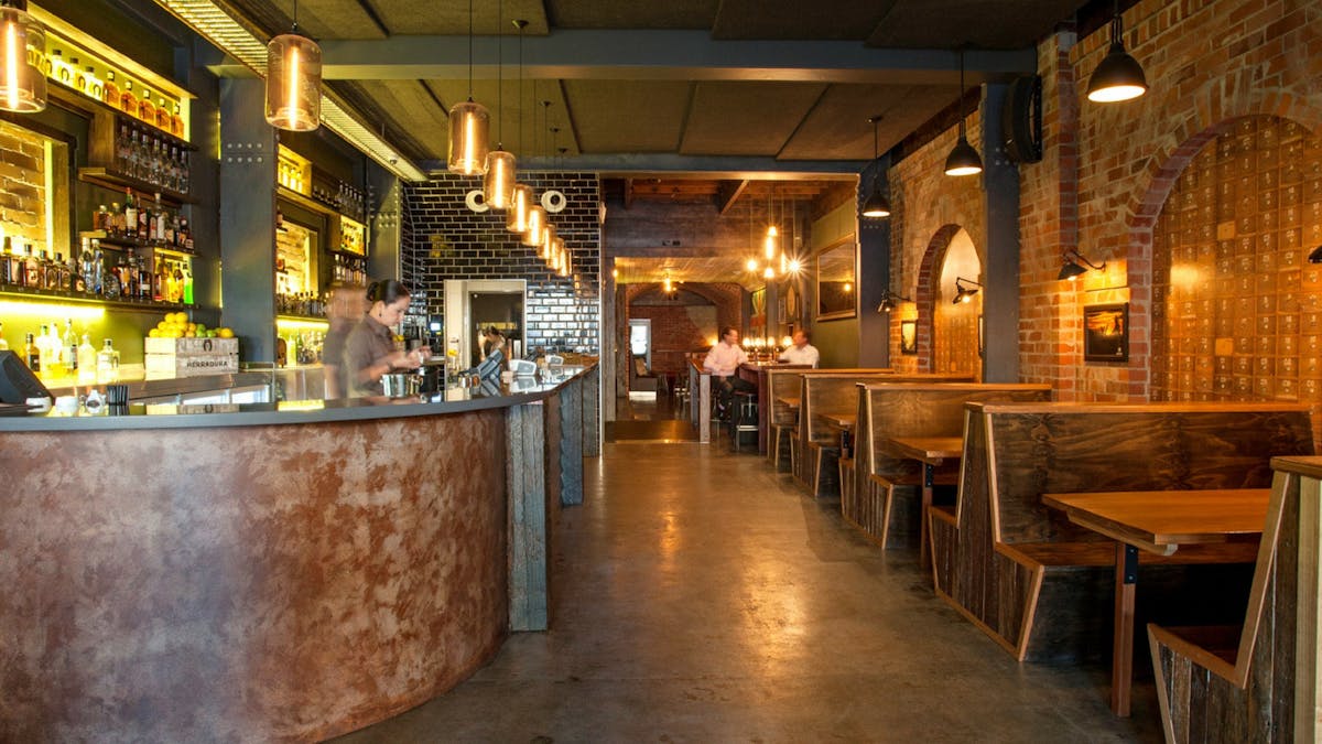 The Dispensary Bar and booth seating