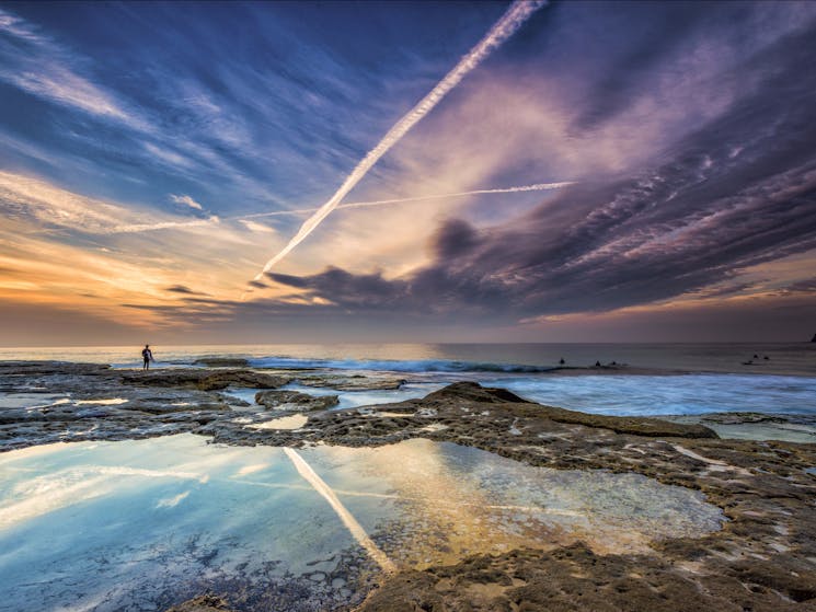 Surfers at sunrise in Tamarama