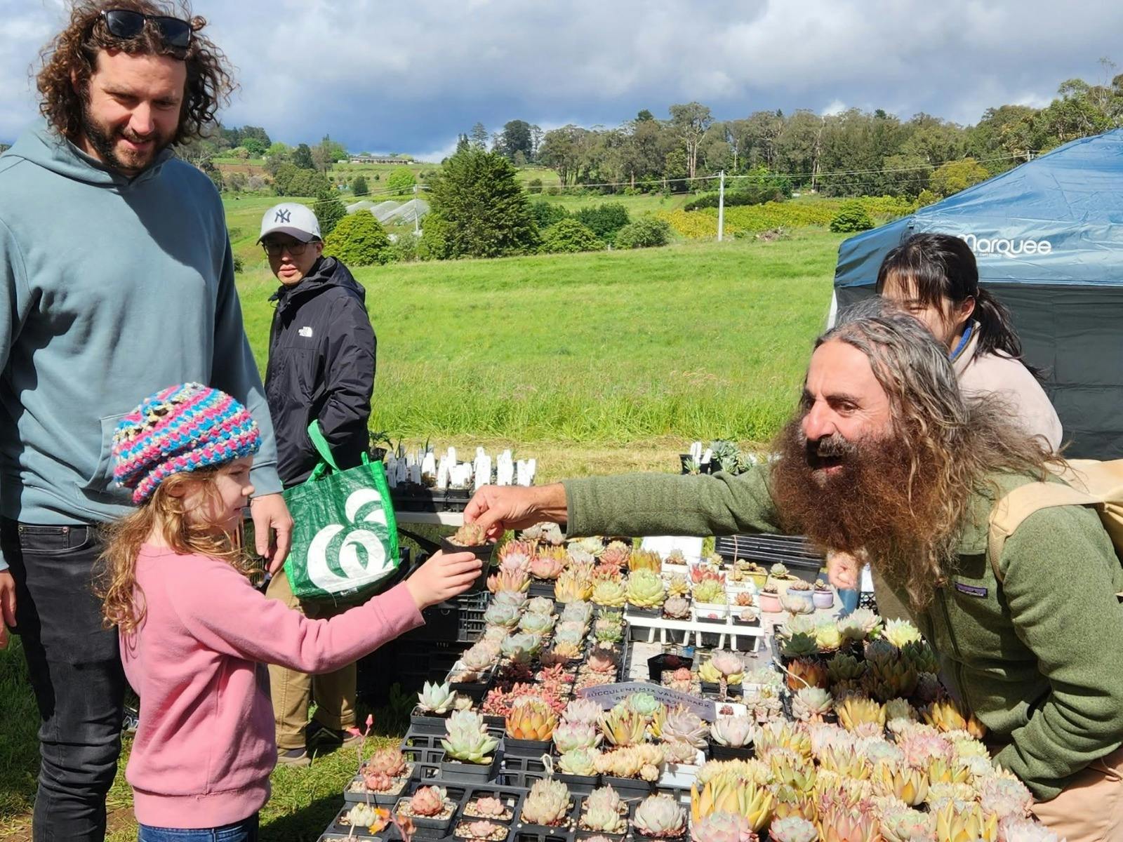 Costa teaching kids about plants