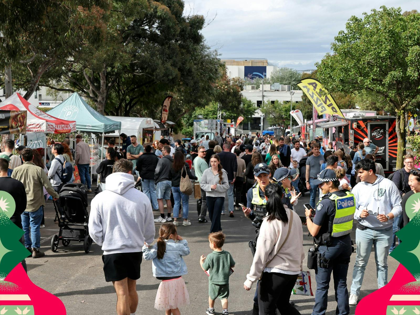 Crowds explore food trucks, market stalls and attractions at Frankston's Christmas Festival.