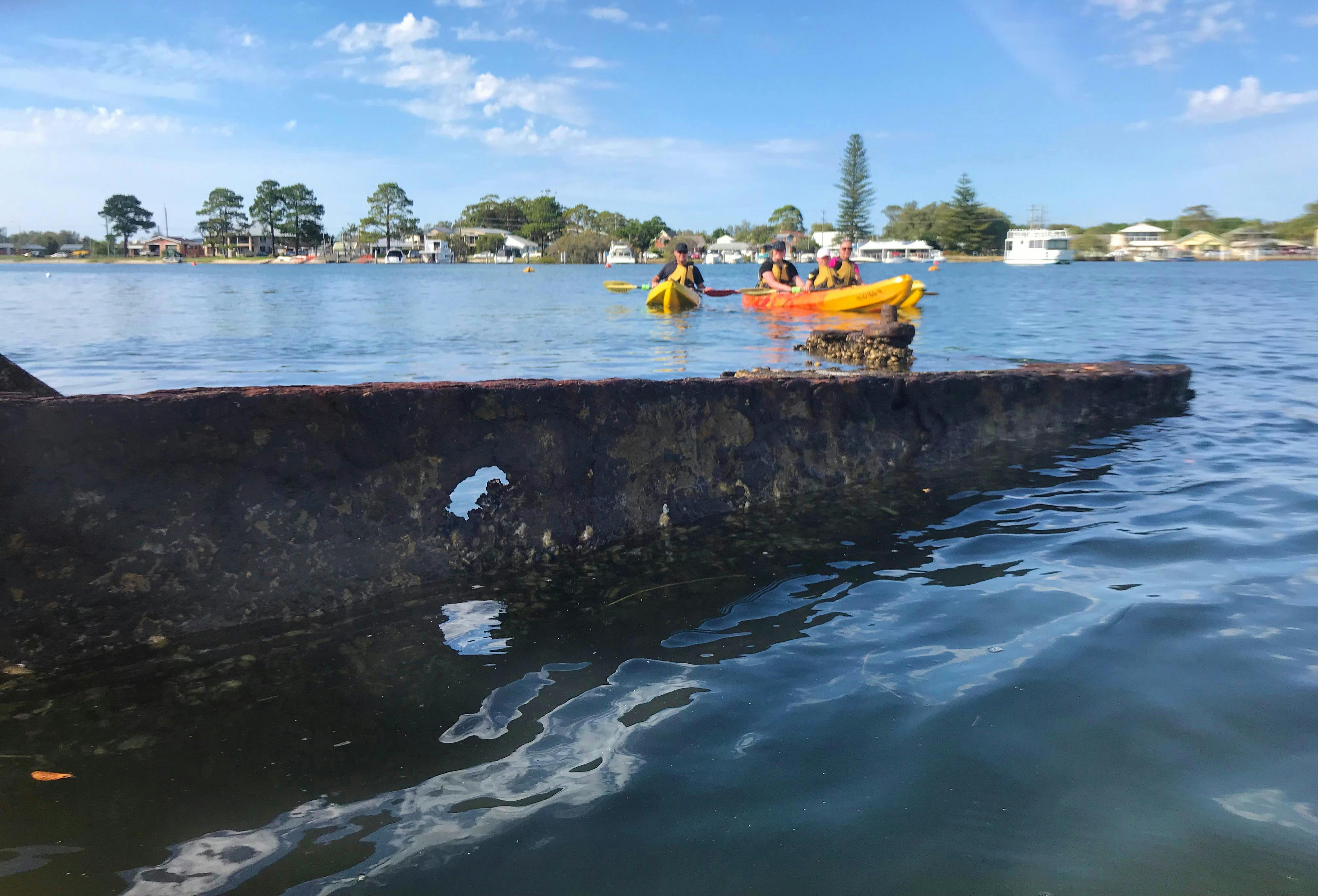 Kayak around ship wrecks and islands