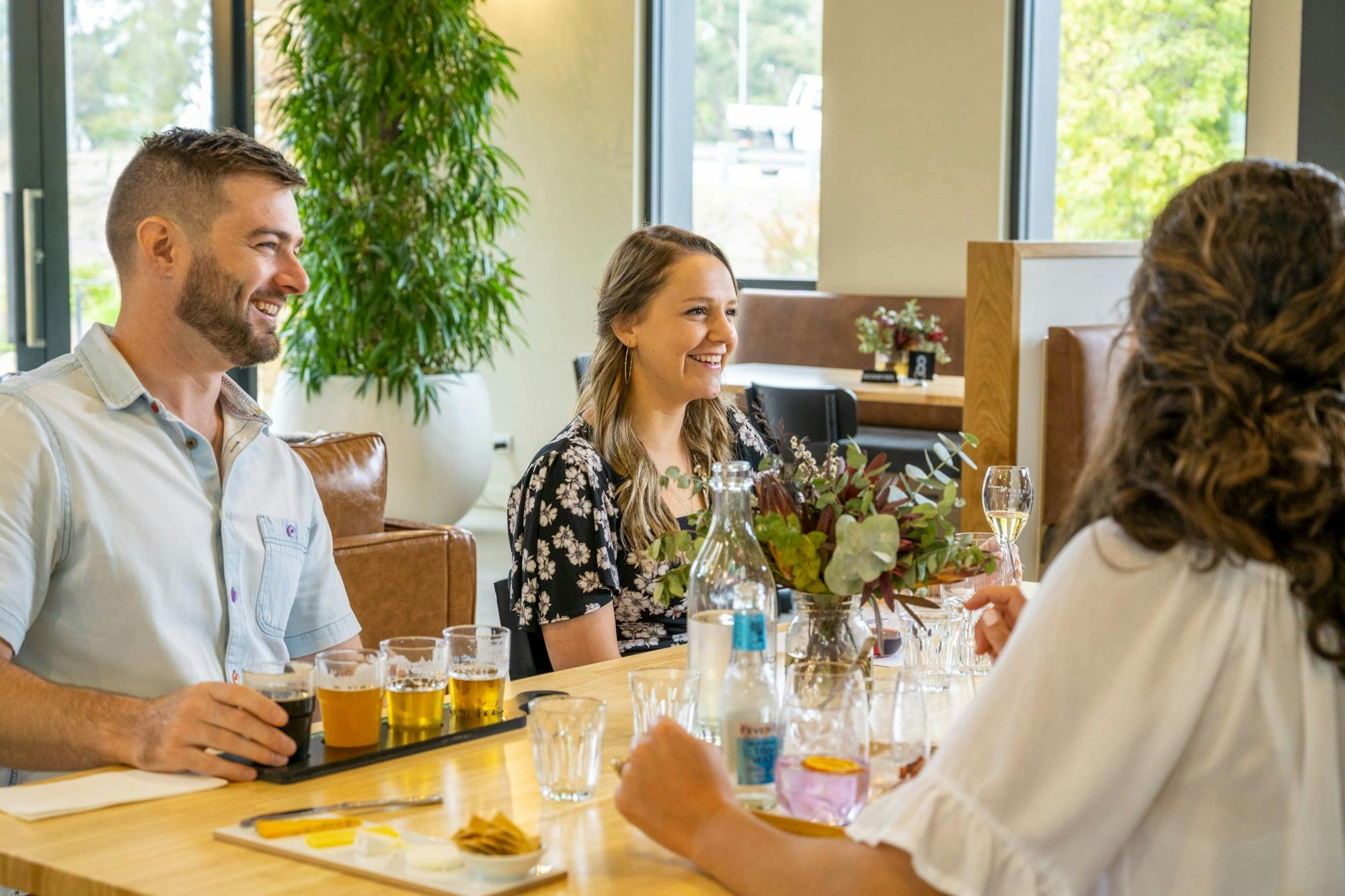 Group of 4 people trying beer, wine and gin
