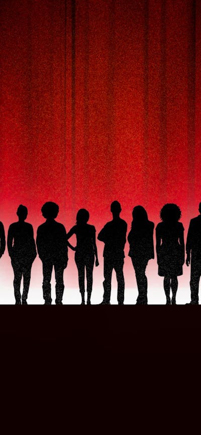 A line of silhouetted people are standing in front of a red curtain