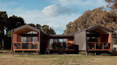 Image depicts both Devine Lodges