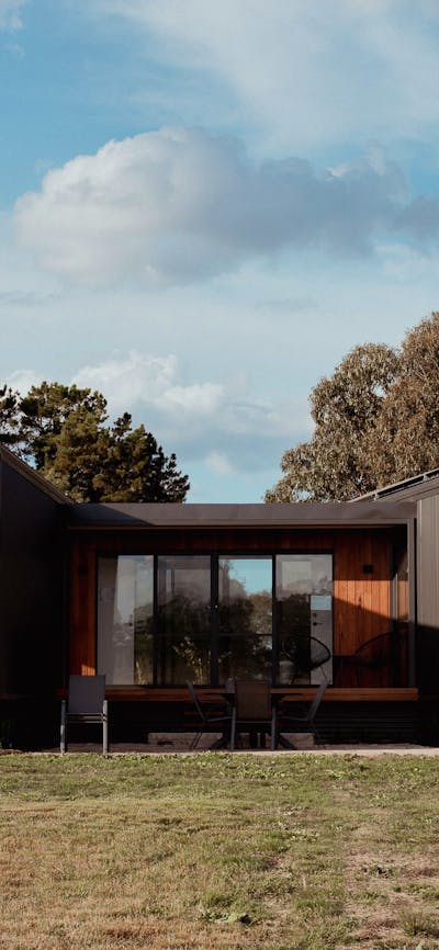 Image depicts both Devine Lodges