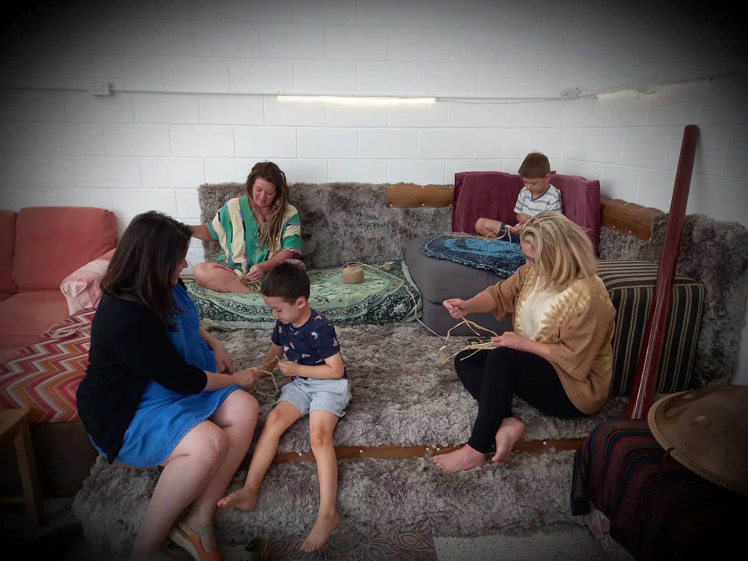 Group enjoying a weaving workshop in the studio