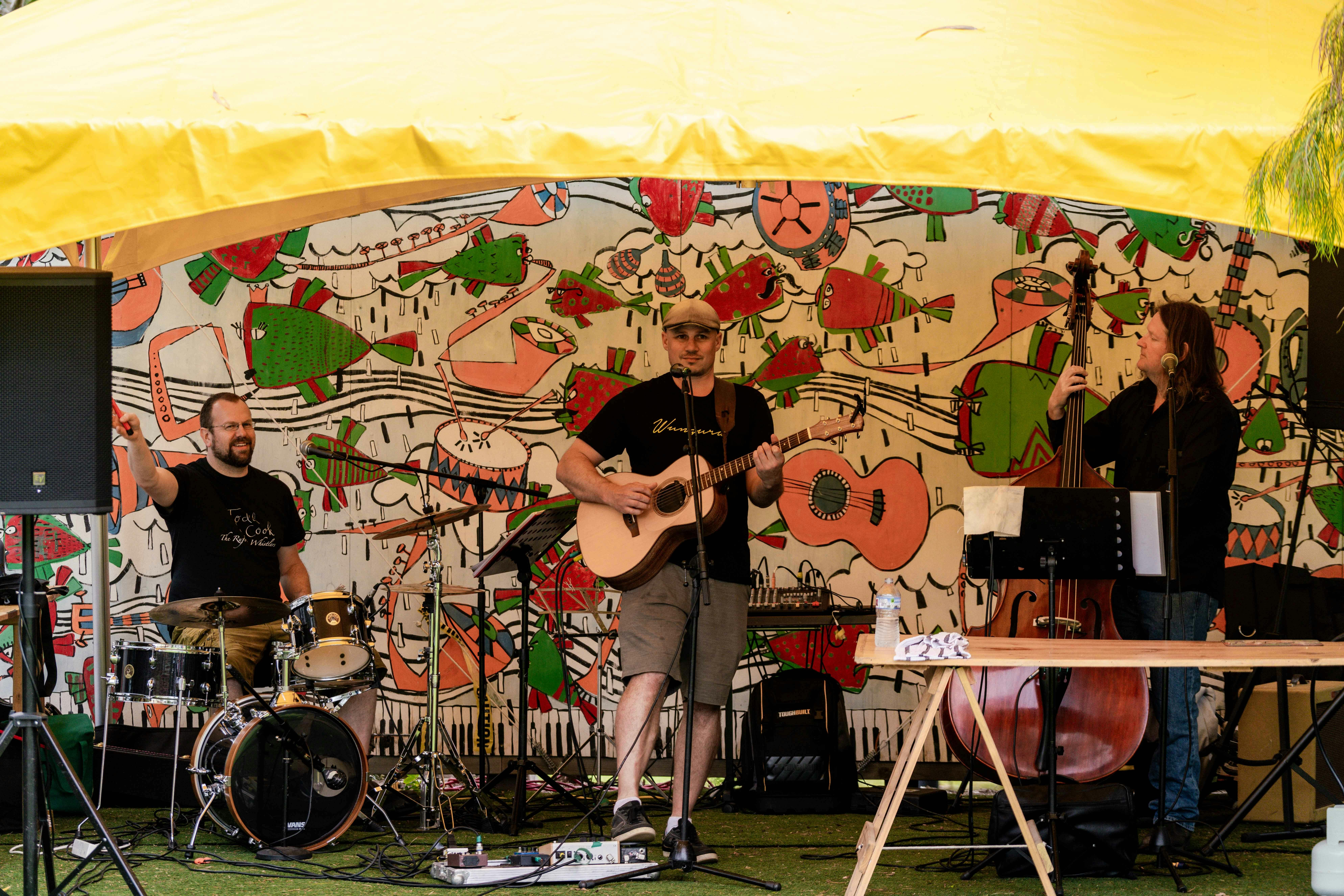 Musicians playing live music at the Market