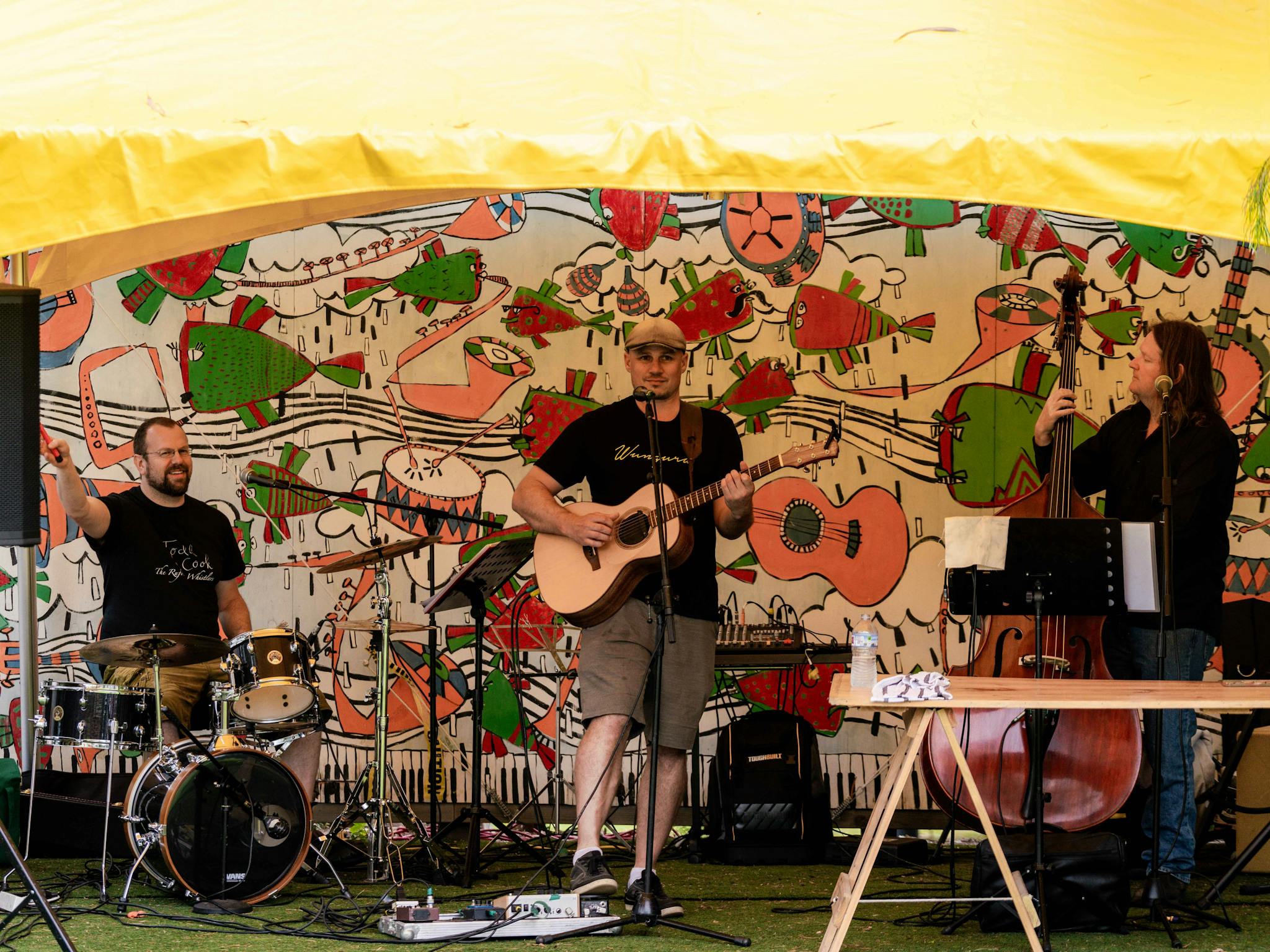 Musicians playing live music at the Market