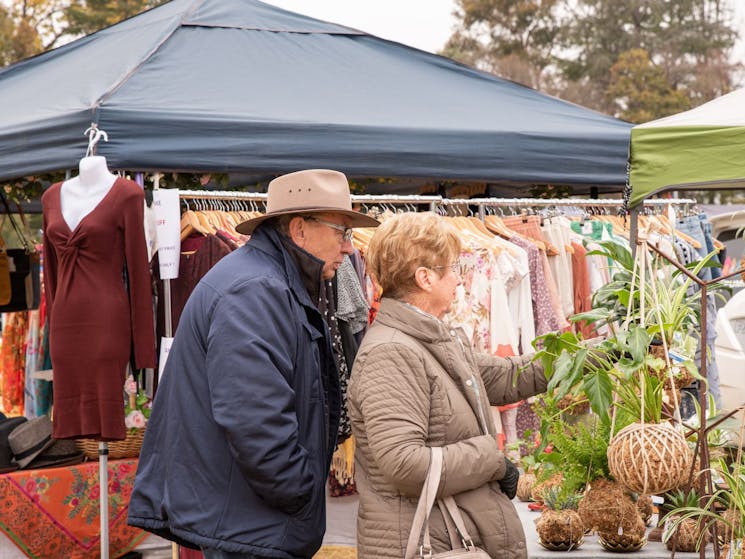 couple looking at market stall