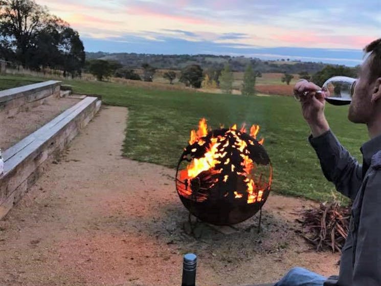 A firepit with wine