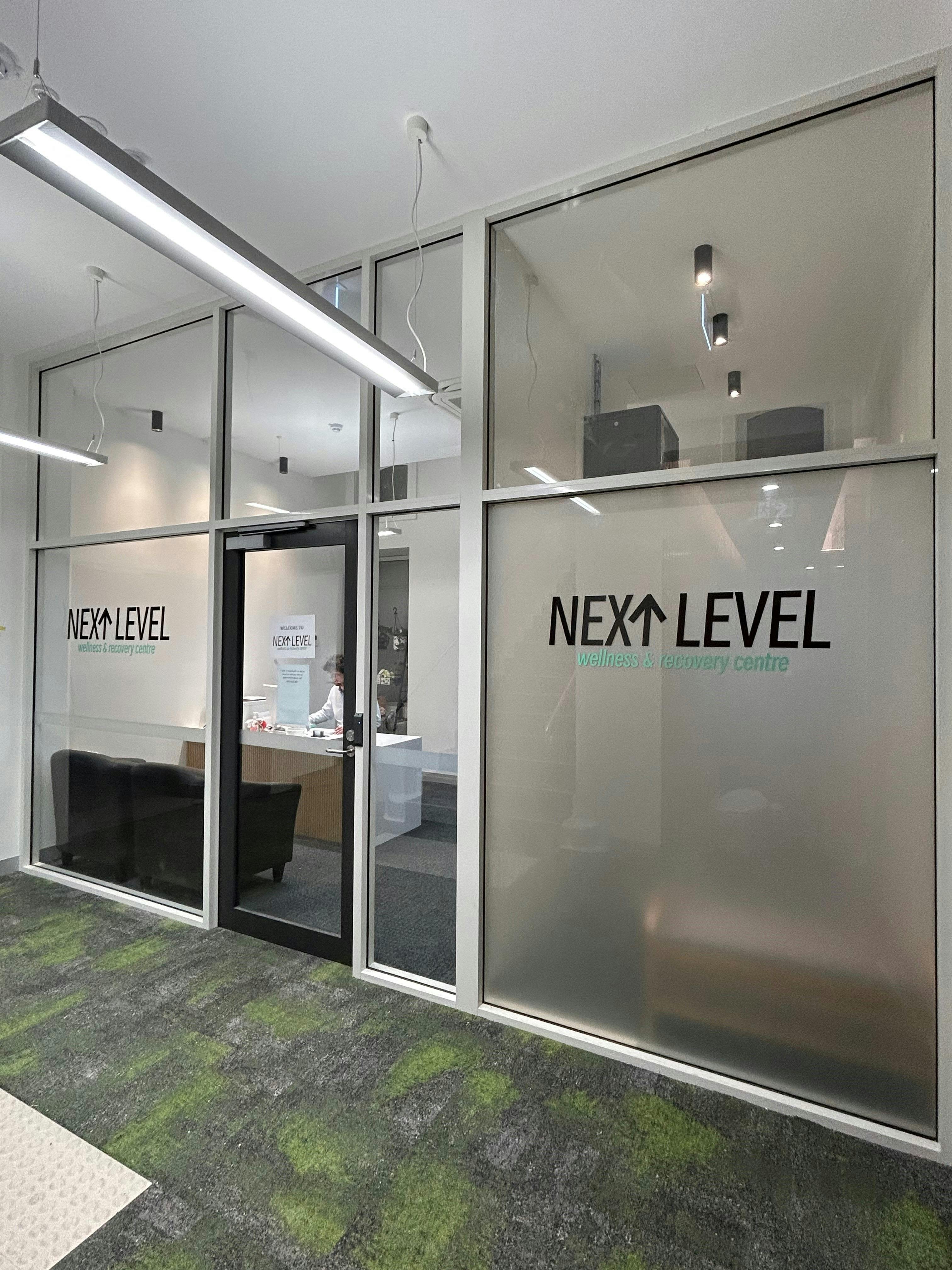 Reception area, large modern windows, glass, logo