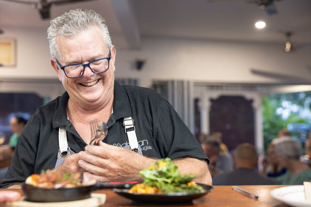 The Boss, Henry Johnston at the pass taking tapas to guests