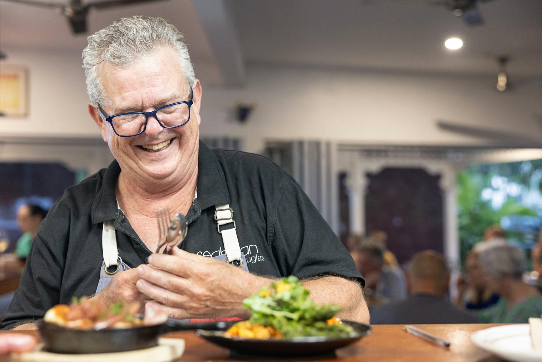 The Boss, Henry Johnston at the pass taking tapas to guests