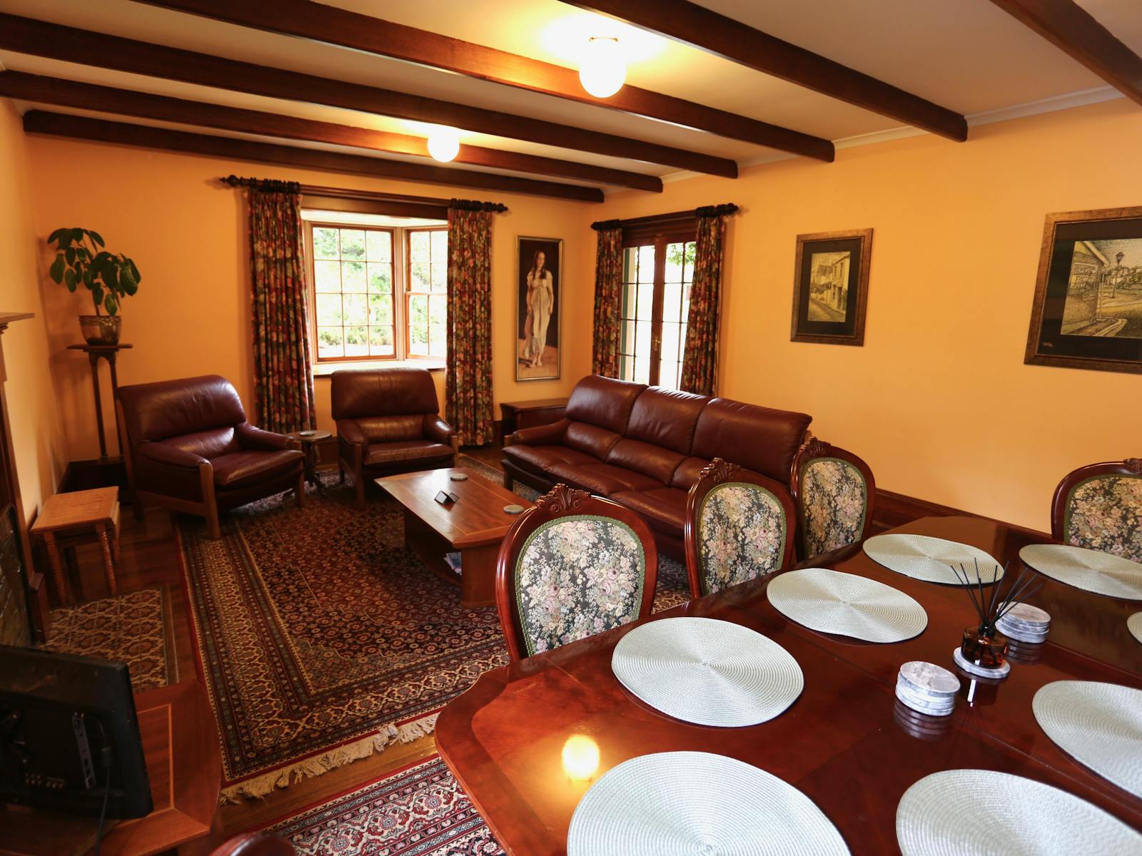warm and cosy colonial lounge room. Evandale boutique accommodation for up to 7 guests.