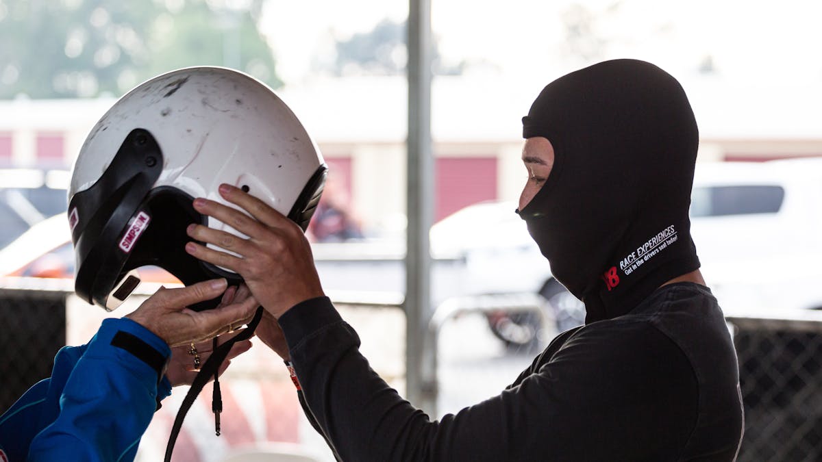 Man putting helmet on