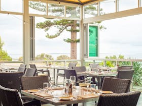 Dining alfresco with panoramic ocean views from Sarin's Restaurant, onsite at the Port Lincoln Hotel