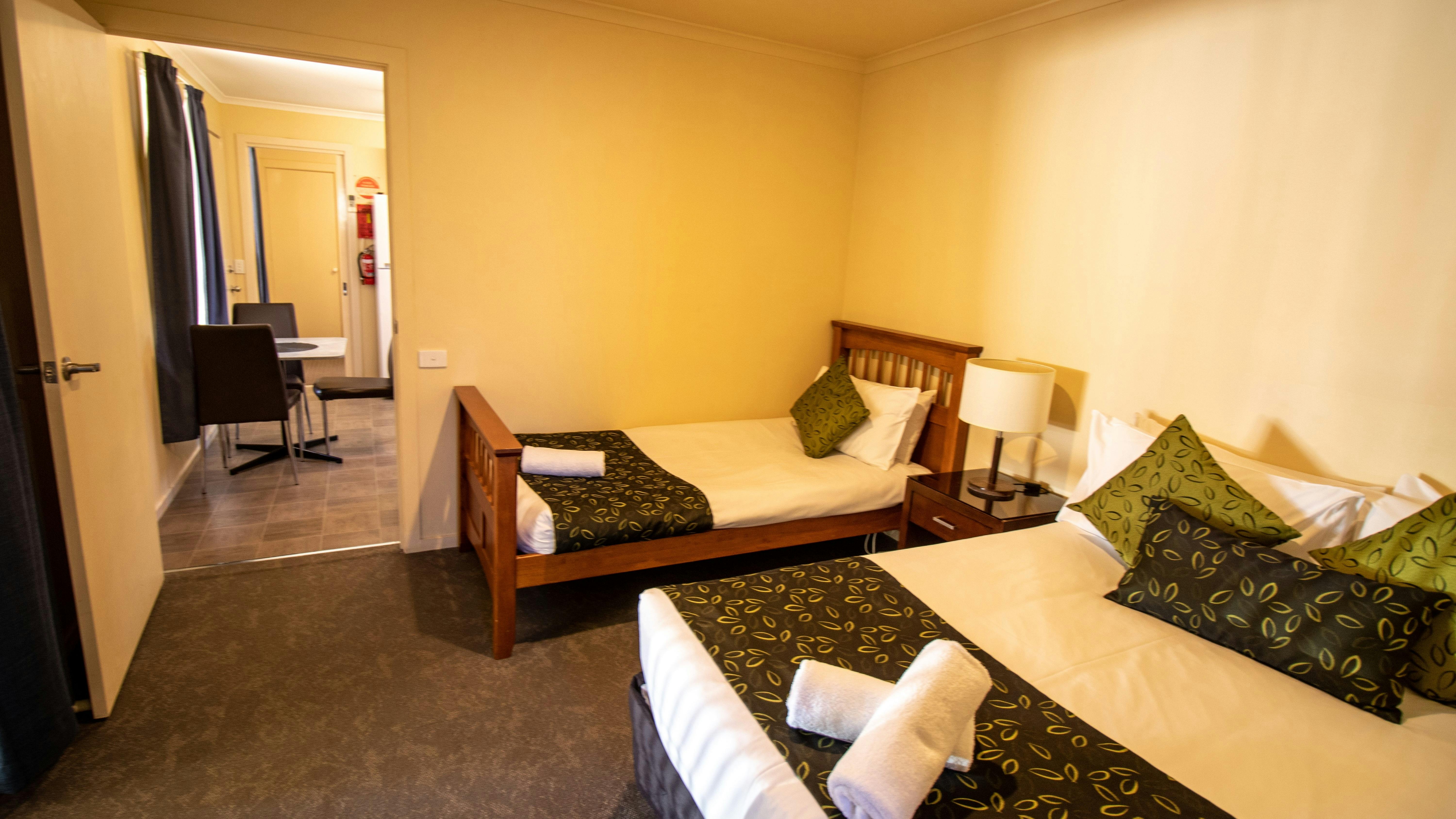 Unit 5 Second Bedroom, 1 king single bed and 1 double bed