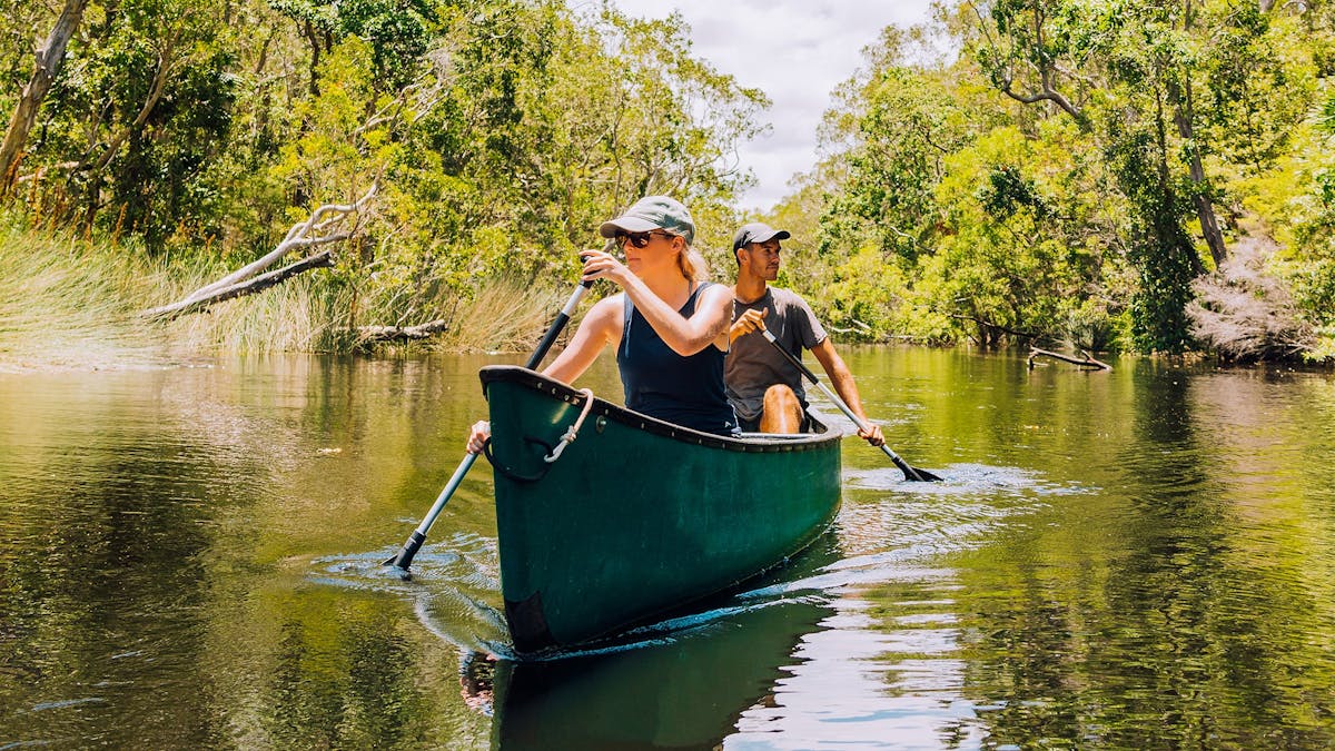 Canoeing through the river of mirrors. From our Cruise 'n' Canoe safari