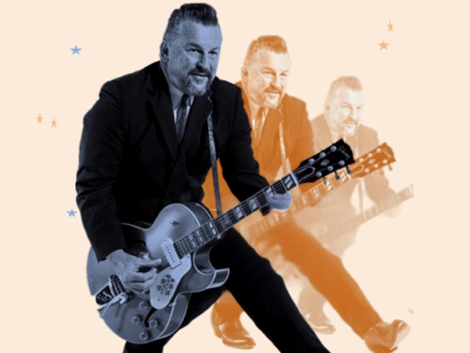 Man in dark suit playing a guitar