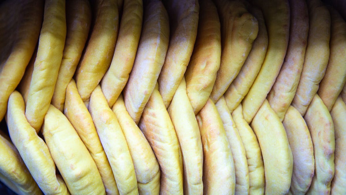 Freshly baked artisan pita bread, made daily with no added preservatives and no added food colour.