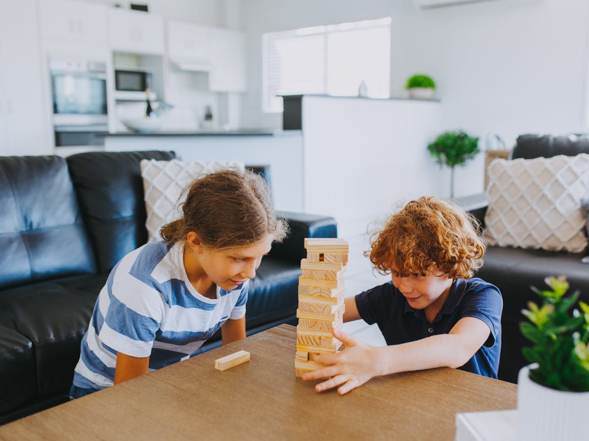 alt text='open plan lounge big enough for families to enjoy playing games'