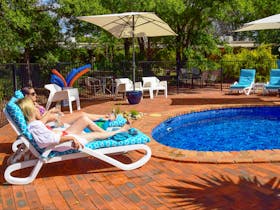 River Country Inn - Relaxing by the Pool