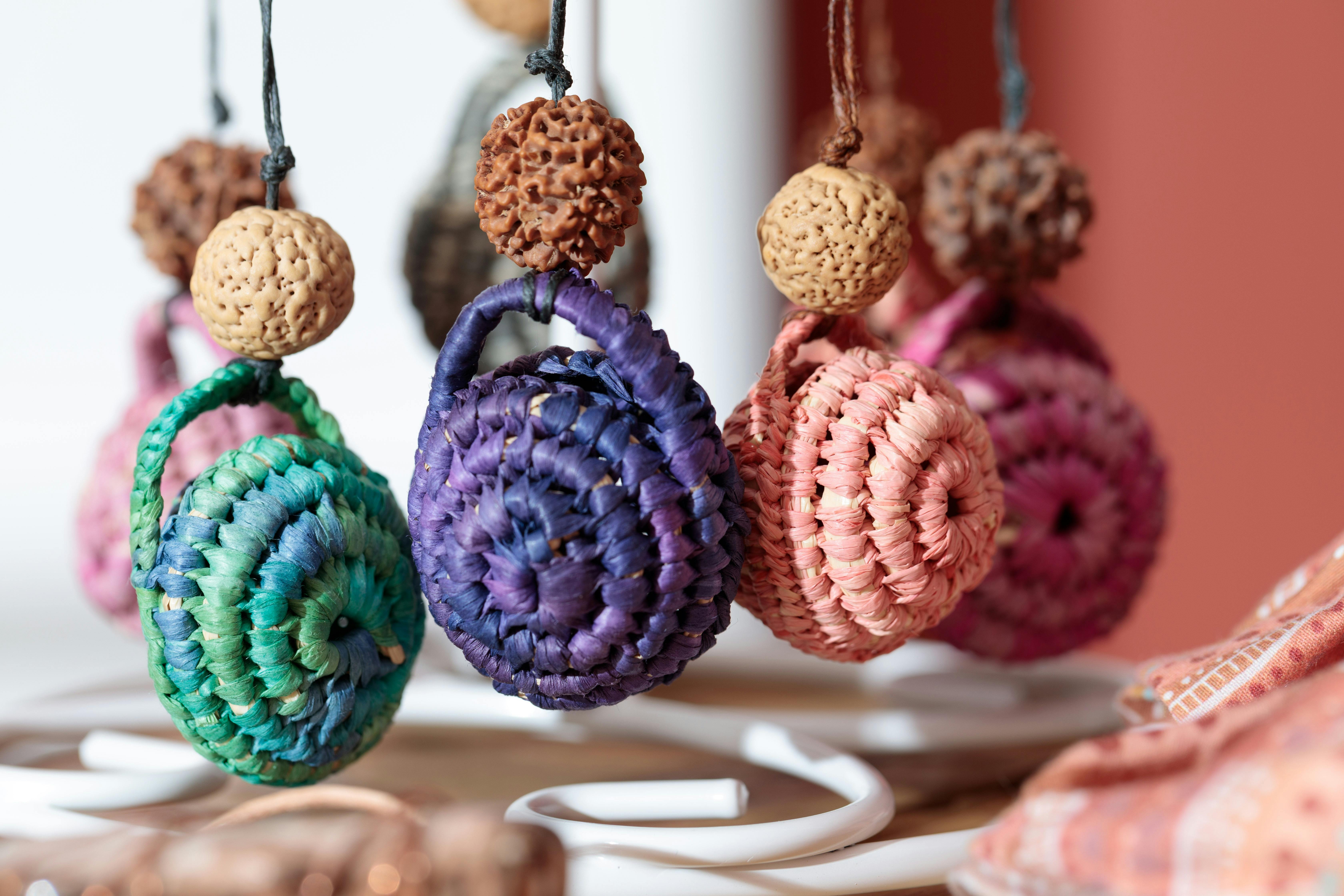 Picture shows colourful hand woven Tidda 'Sister' Basket Necklaces