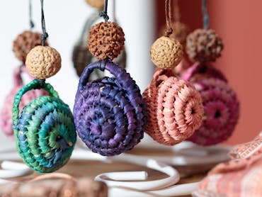 Picture shows colourful hand woven Tidda 'Sister' Basket Necklaces