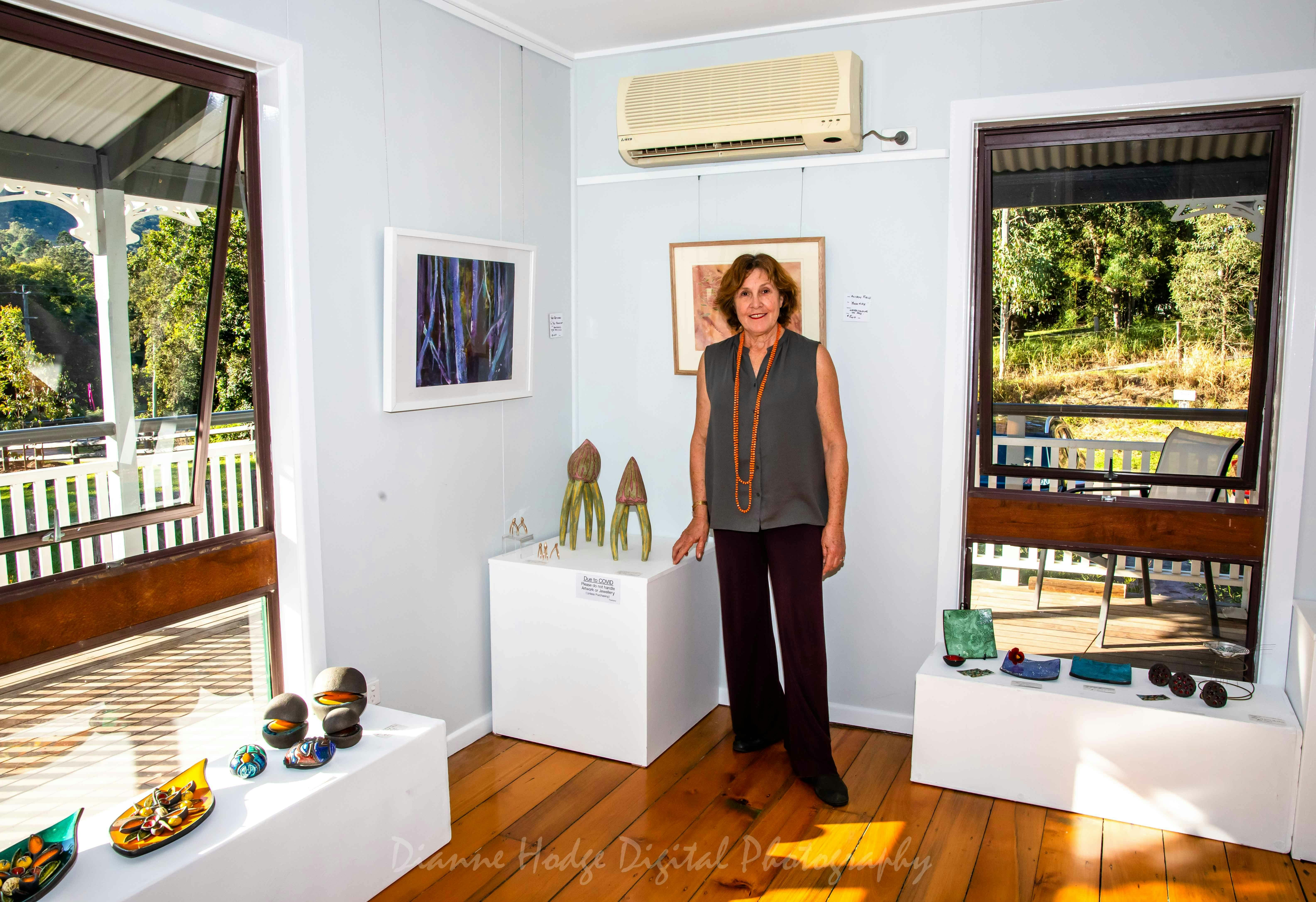 Deb Pettigrew standing inside her Good Egg Gallery