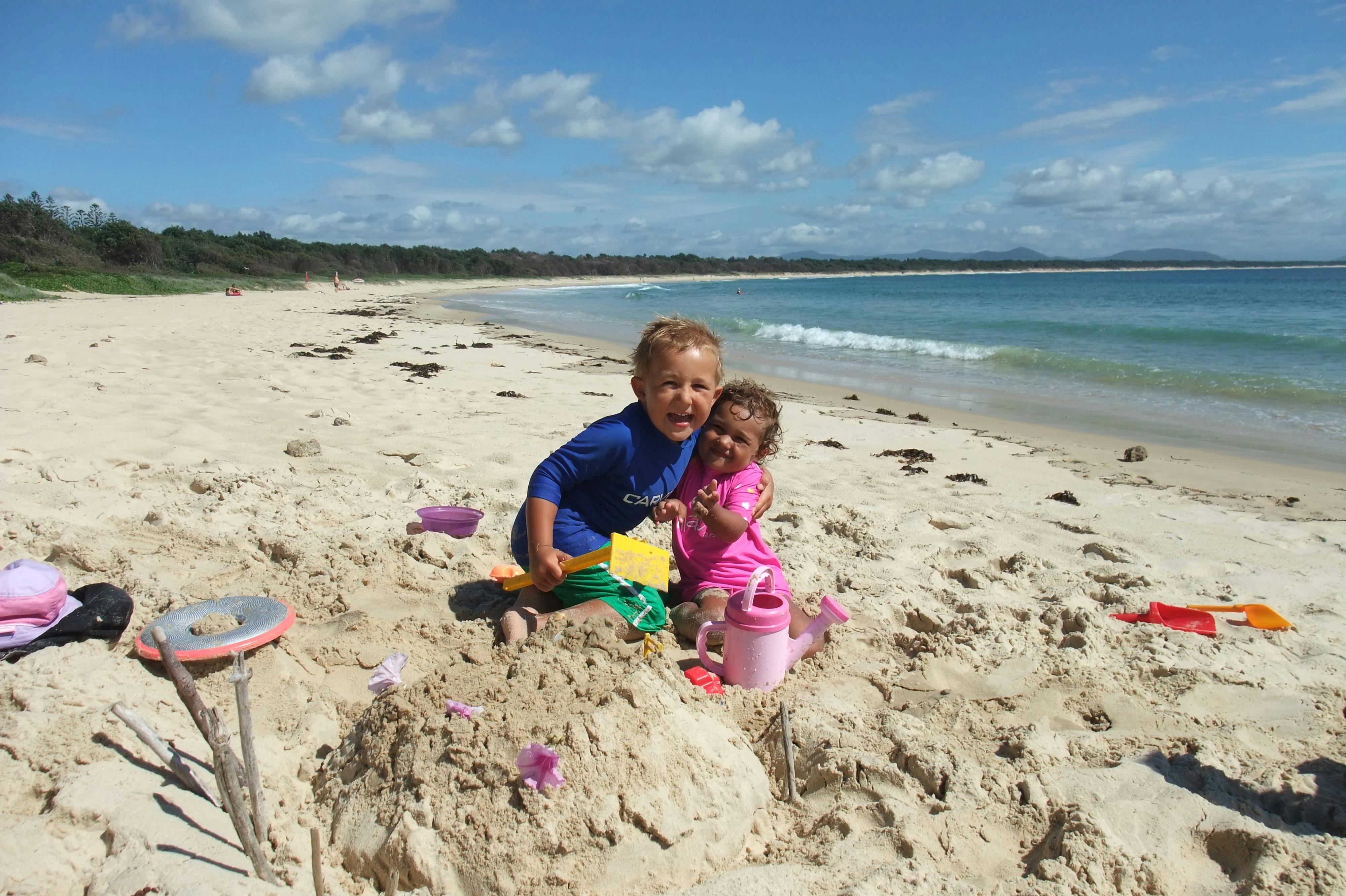 children having fun in the sand on Foster Beach Scotts Head