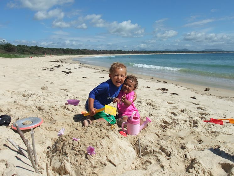 children having fun in the sand on Foster Beach Scotts Head