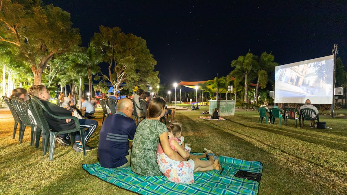 Families watching a movie at the Outdoor Cinema at BIG4 Adventure Whitsunday Resort