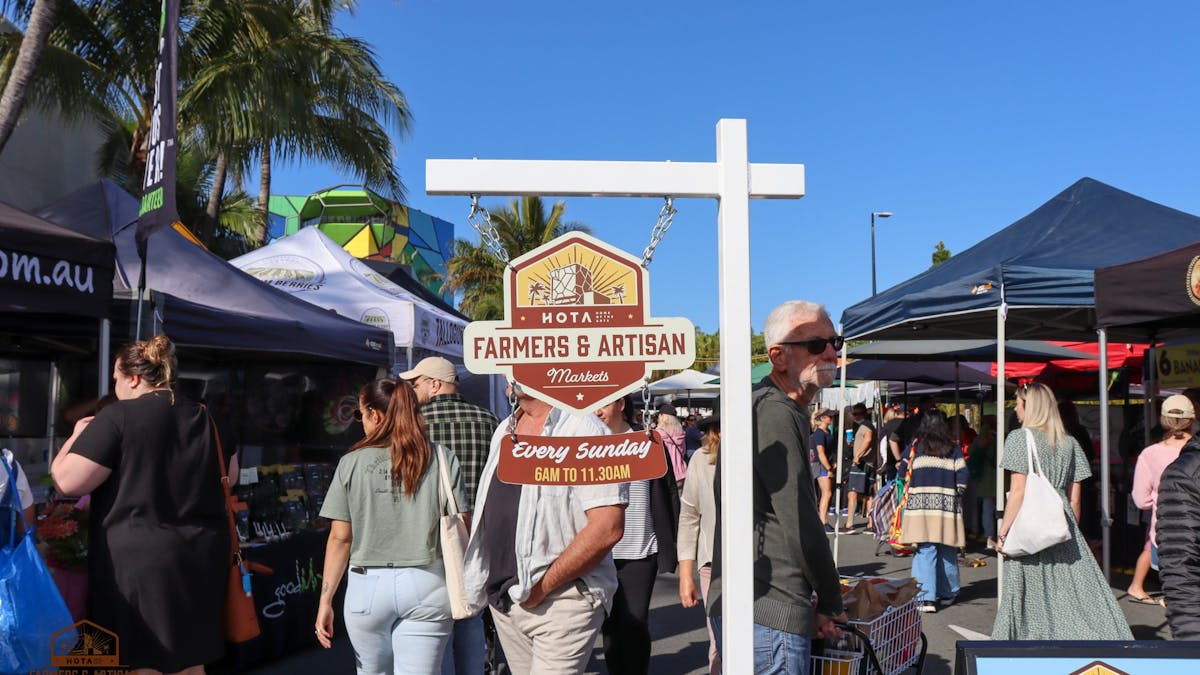 a picture of the entrance to hota markets with the sign