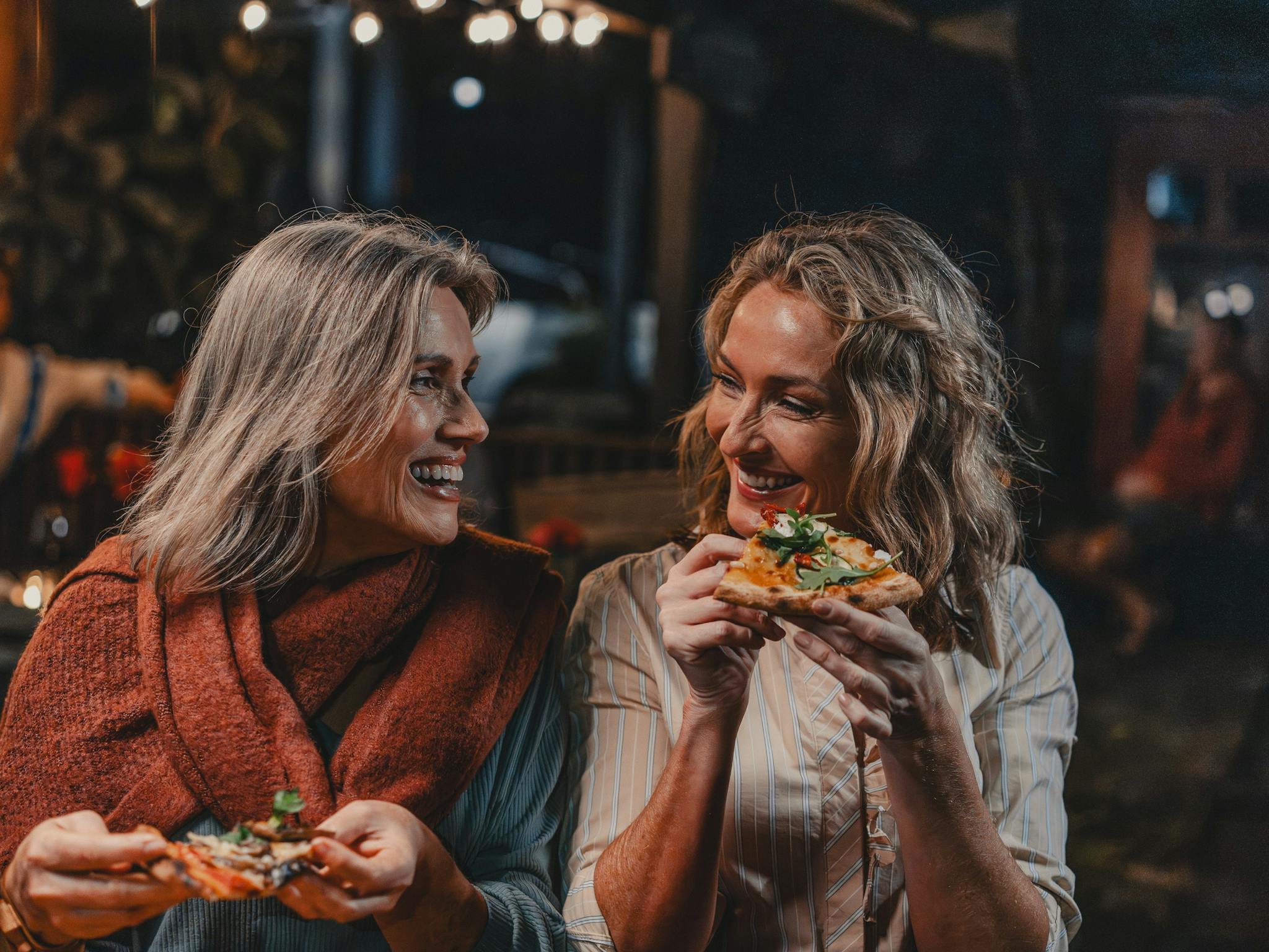 Couple enjoying pizza