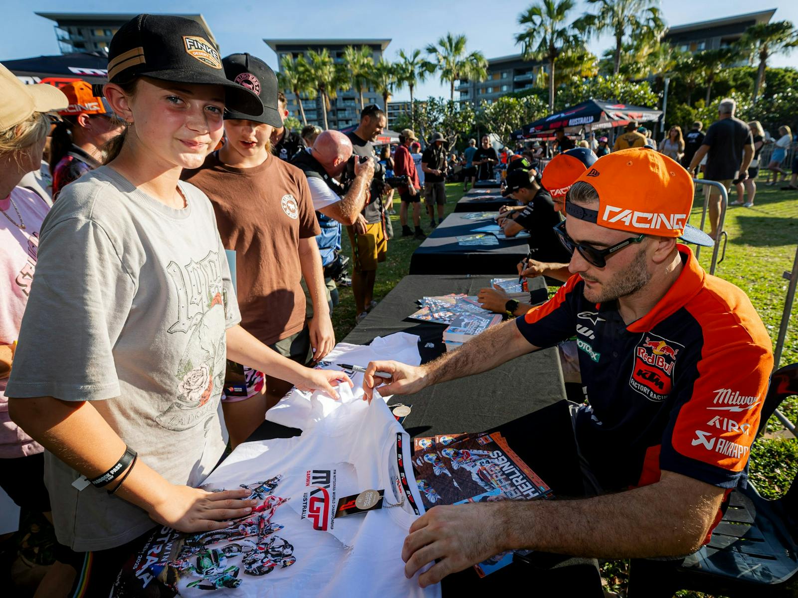 Kids at the riders signing with MXGP riders signing shirts