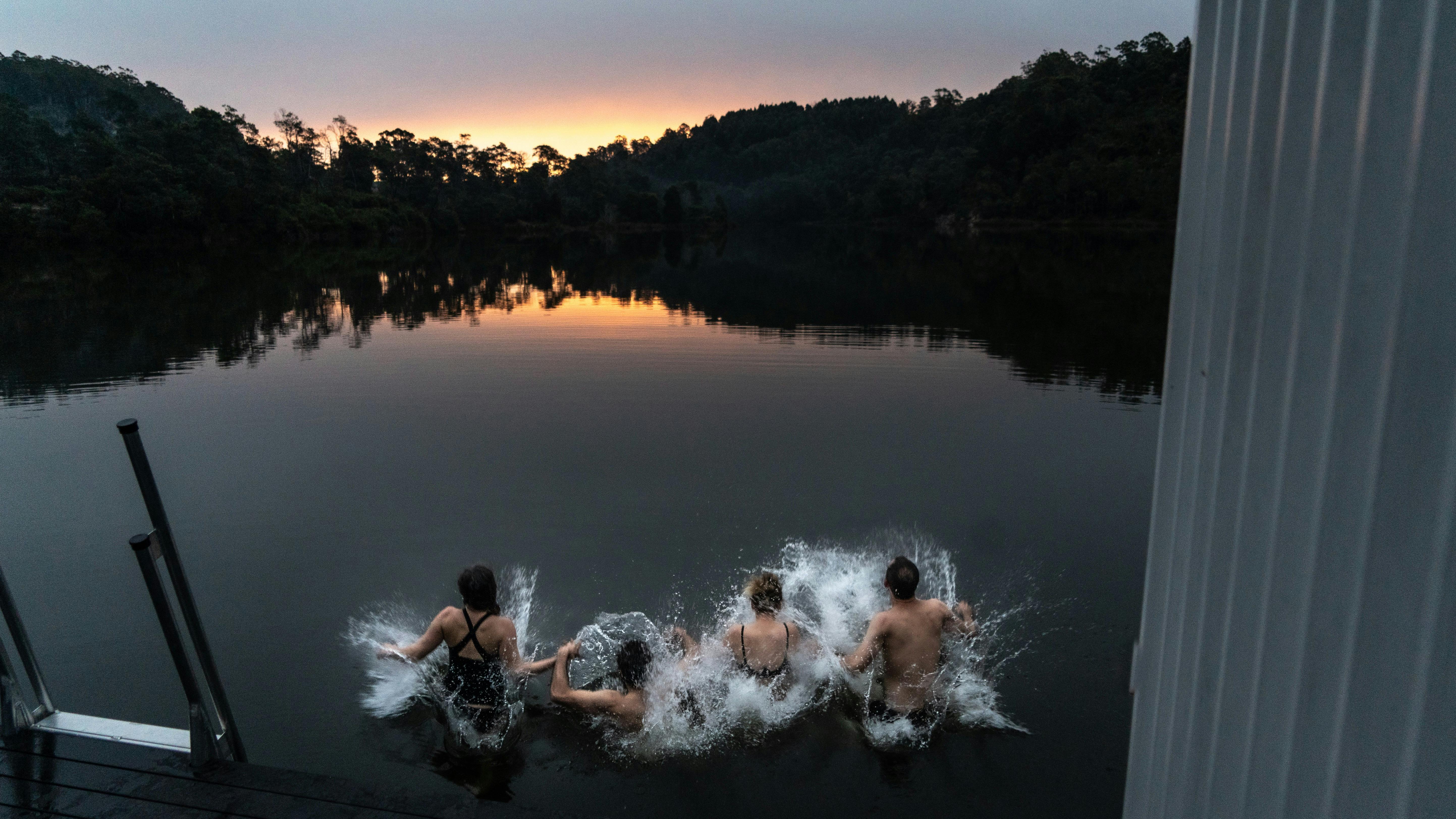 People in a lake swimming