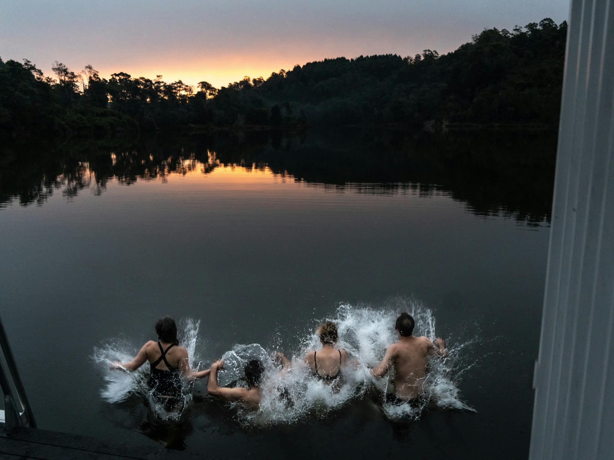 People in a lake swimming