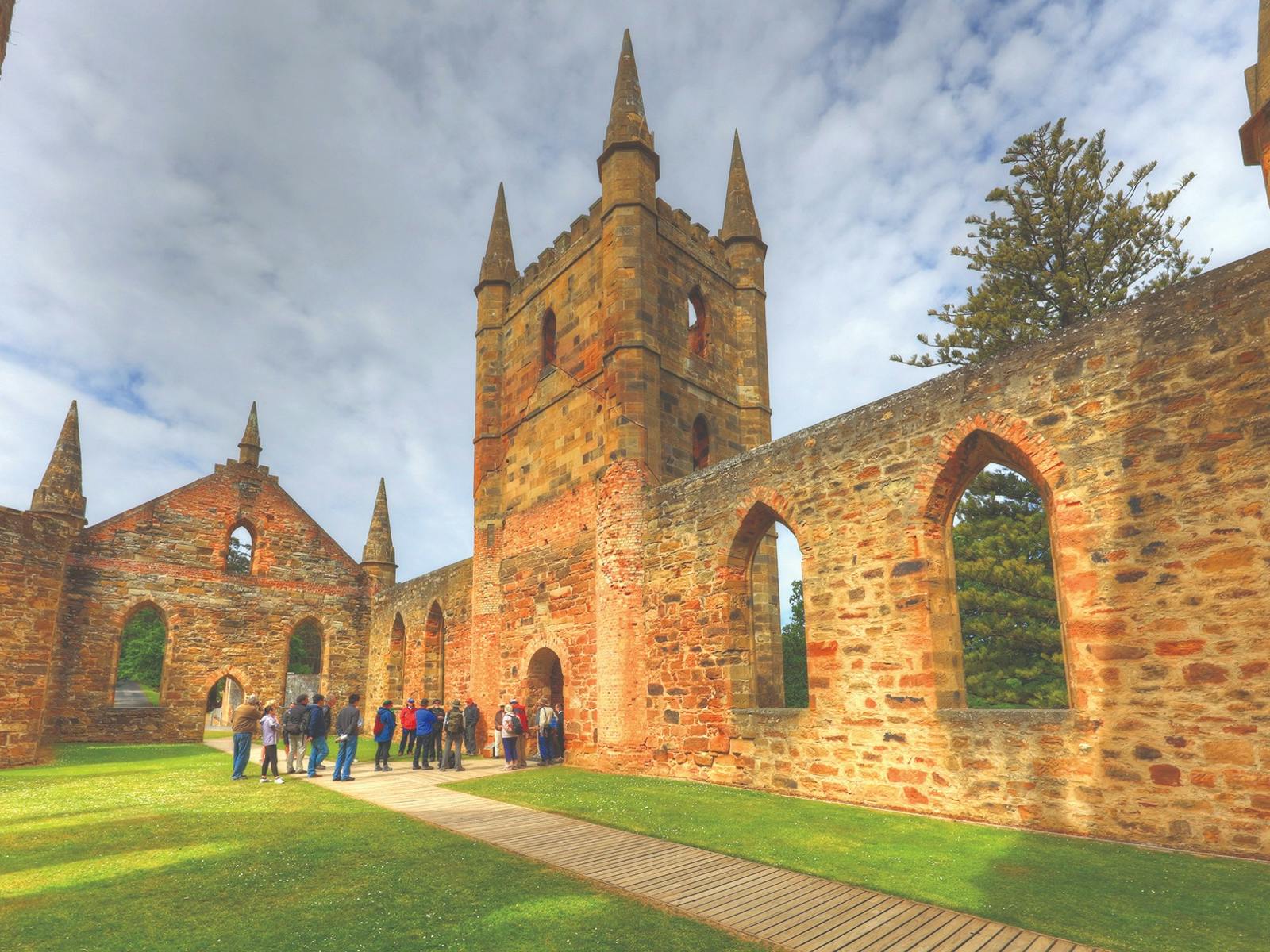 Cruise guests explore the historic ruins of the Port Arthur settlement in Tasmania