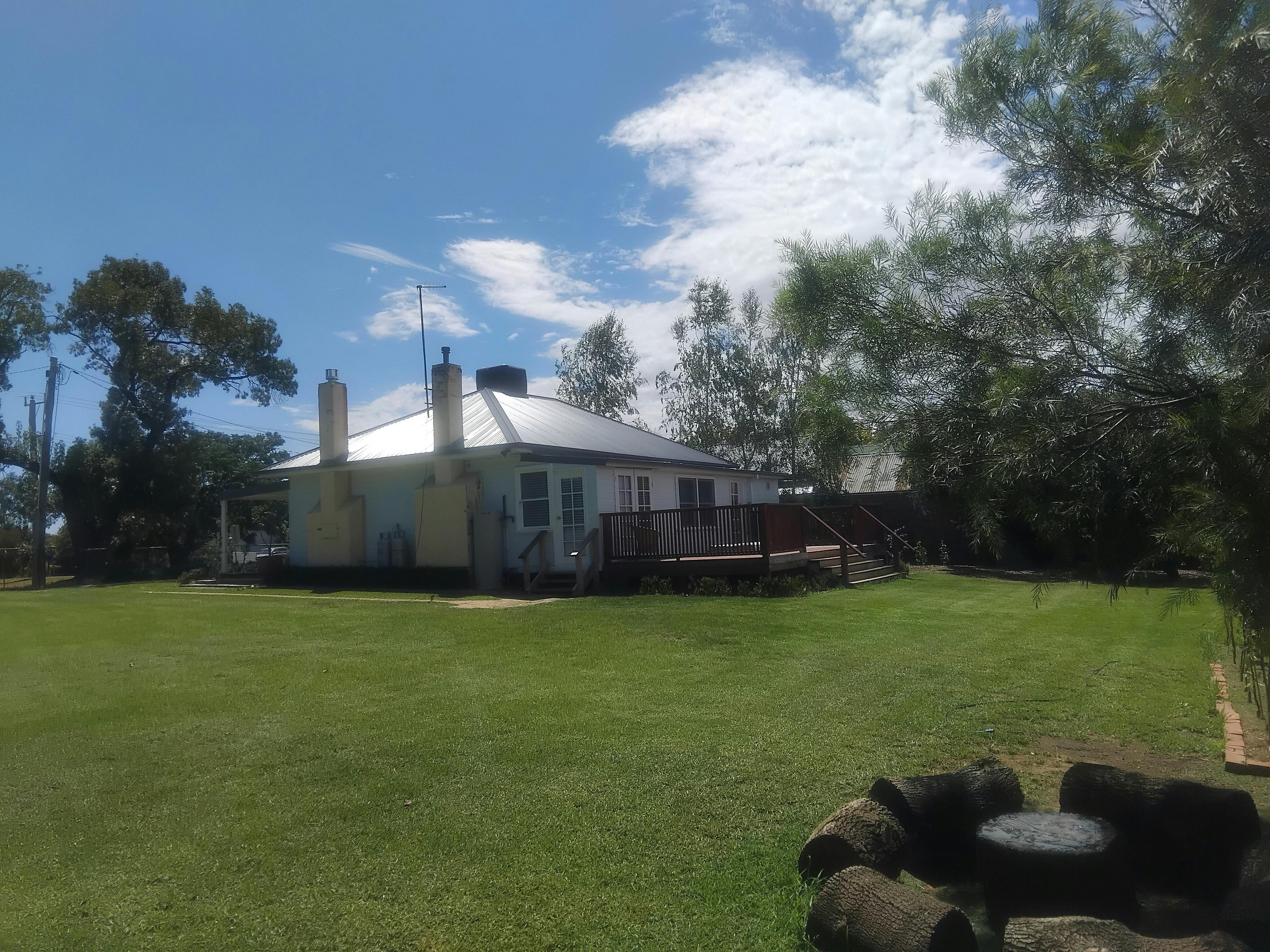 A back view of Milawa Cottage's spacious grounds