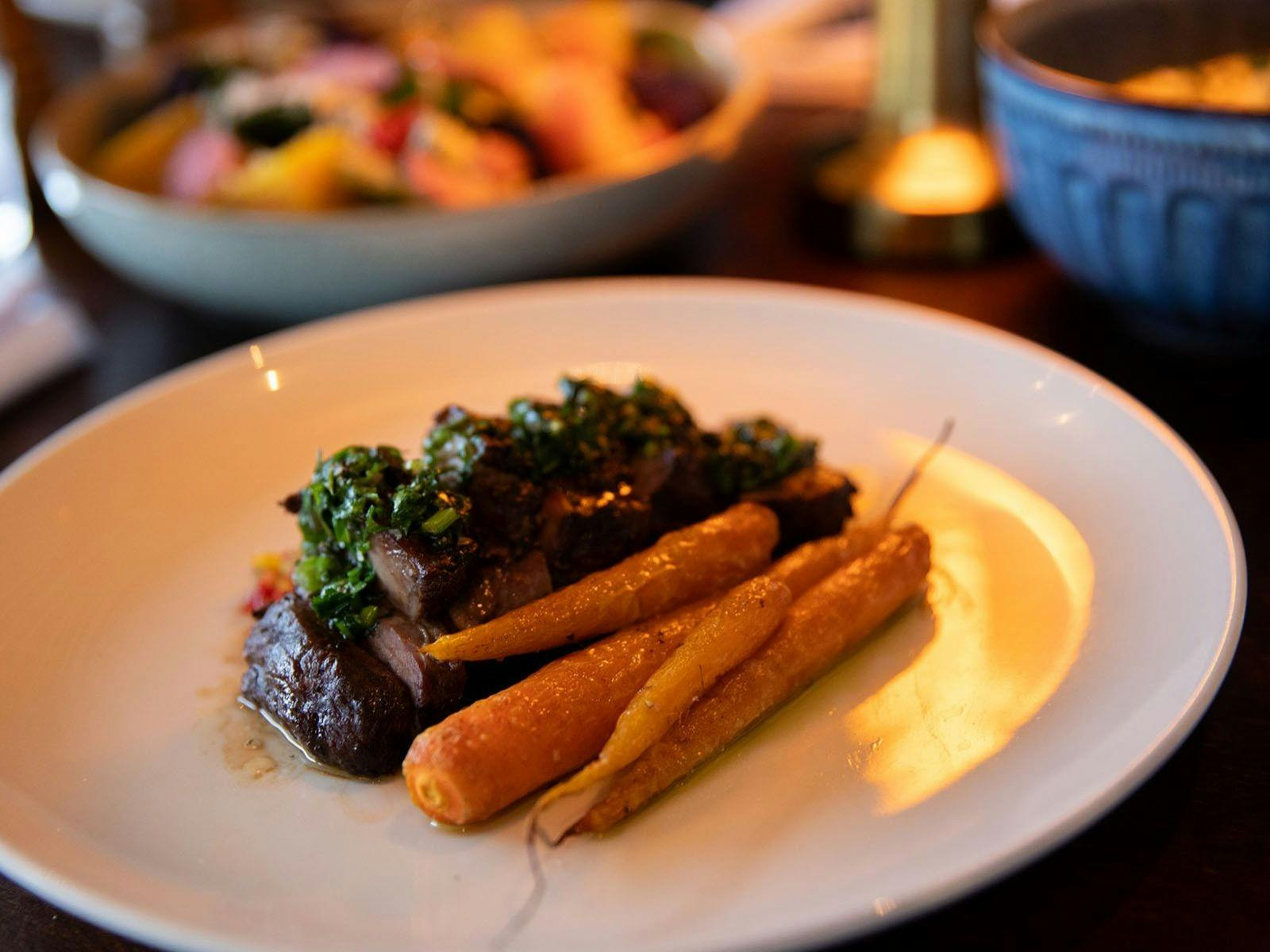 Lamb Rump Cap – Succulent lamb with glazed carrots, tomato salsa and chimichurri