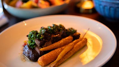 Lamb Rump Cap – Succulent lamb with glazed carrots, tomato salsa and chimichurri