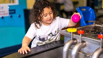 Young child playing at Questacon