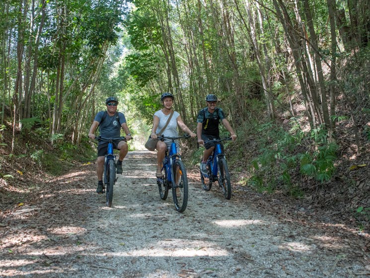 Riders enjoying the natural environment on the Northern Rivers Rail Trail with Better By Bike